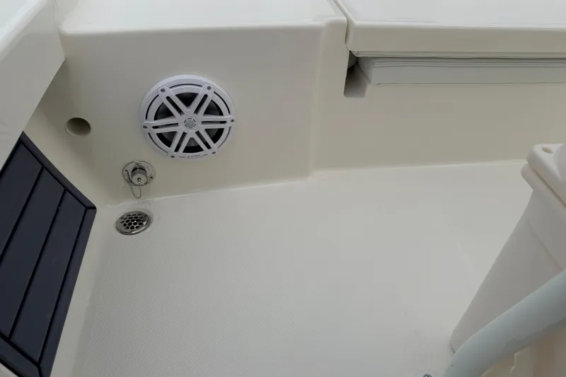 Slide: The Image of 2026 Pathfinder 2200 TRS boat interior with speaker and drainage system. - 47