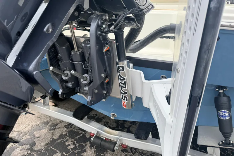 Slide: The Image of Close-up of 2026 Pathfinder 2200 TRS boat engine and hydraulic system. - 5