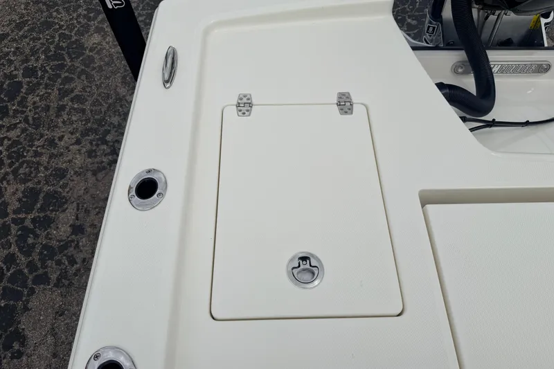 Slide: The Image of 2026 Pathfinder 2200 TRS boat deck with storage hatch and fittings. - 54