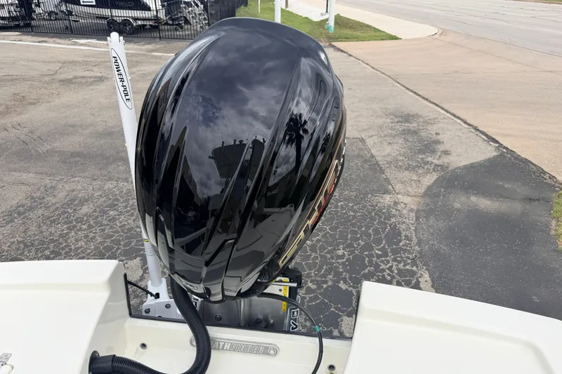 Slide: The Image of 2026 Pathfinder 2200 TRS boat with sleek black motor and Power-Pole anchor. - 56