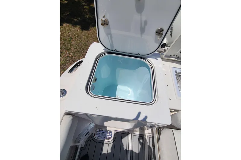 Slide: The Image of Open storage compartment on 2022 Sea Fox 368 Commander boat, showcasing interior space. - 10