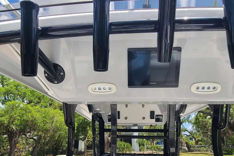 Slide: The Image of 2022 Sea Fox 368 Commander boat console with Garmin display and rod holders. - 15