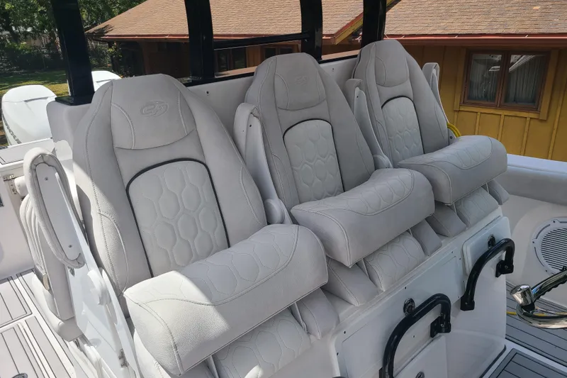 Slide: The Image of Luxurious seating on 2022 Sea Fox 368 Commander boat, featuring plush, ergonomic design. - 16