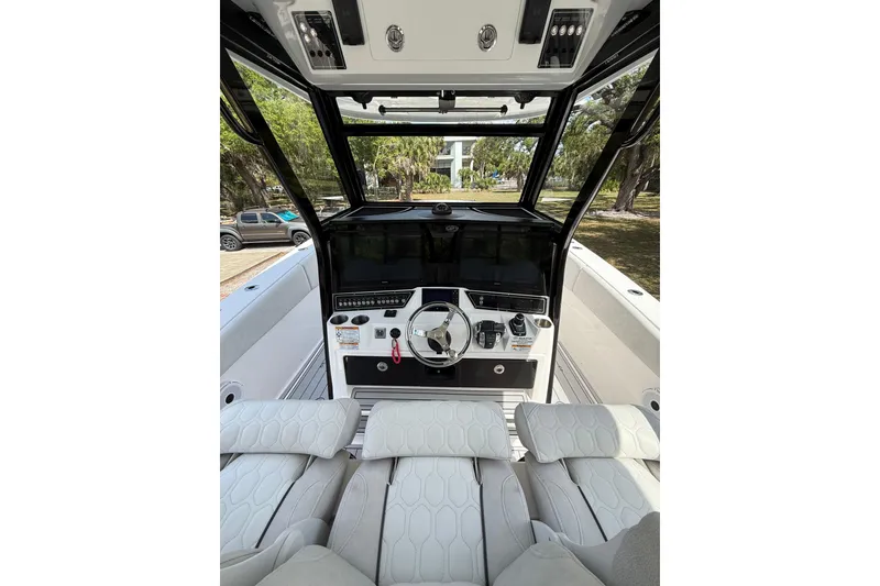 Slide: The Image of Interior view of 2022 Sea Fox 368 Commander boat cockpit with modern controls and seating. - 18