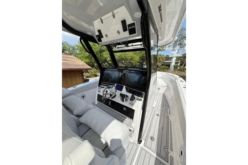 Slide: The Image of 2022 Sea Fox 368 Commander boat cockpit with modern controls and seating. - 20