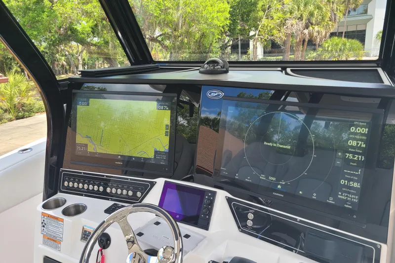 Slide: The Image of 2022 Sea Fox 368 Commander helm with advanced navigation displays and controls. - 21