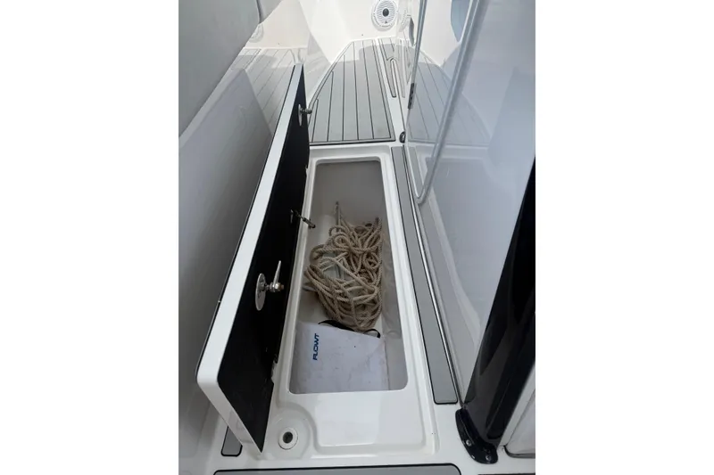 Slide: The Image of Storage compartment on 2022 Sea Fox 368 Commander boat with rope inside. - 28