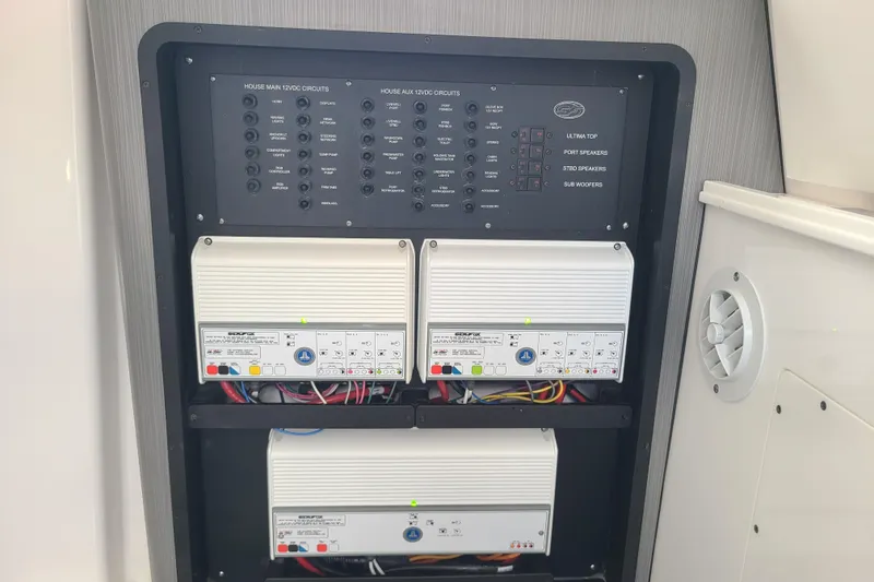 Slide: The Image of Electrical panel of 2022 Sea Fox 368 Commander boat with circuit breakers and wiring. - 34