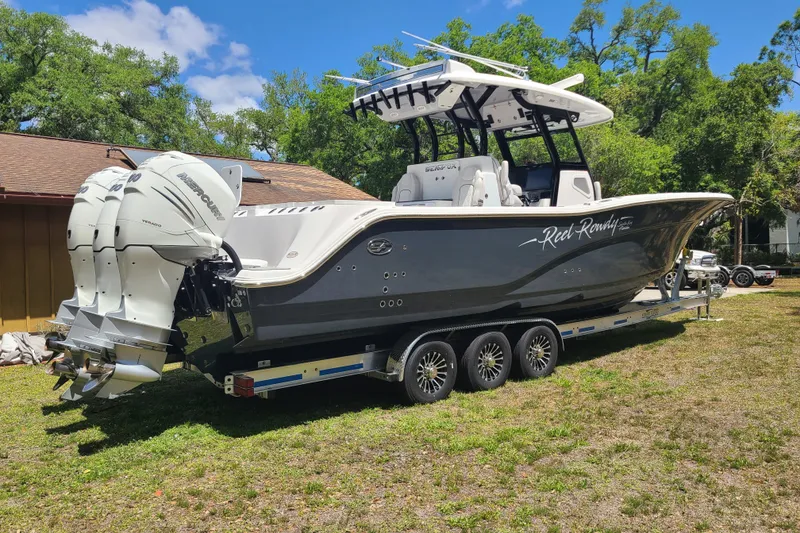 Slide: The Image of 2022 Sea Fox 368 Commander boat on trailer with triple Mercury outboard engines. - 4