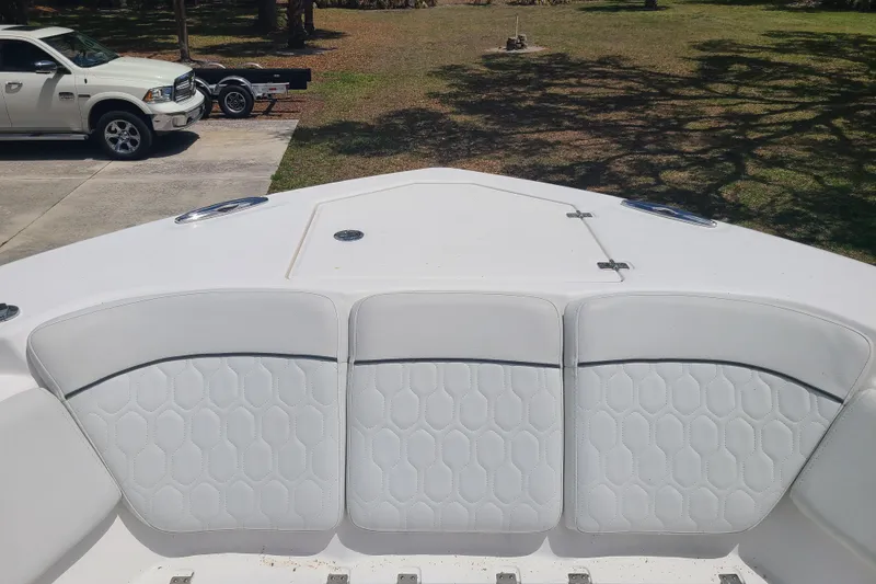 Slide: The Image of 2022 Sea Fox 368 Commander boat interior with white cushioned seating. - 41