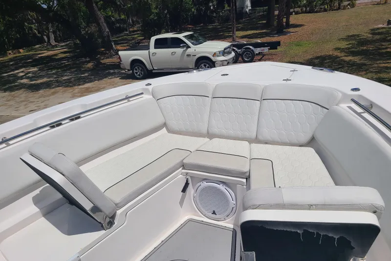 Slide: The Image of 2022 Sea Fox 368 Commander boat with spacious white seating area. - 42