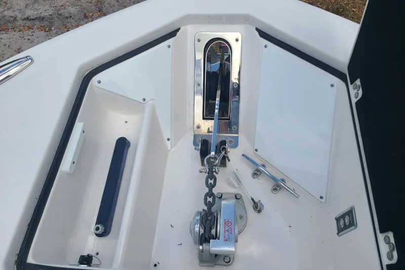 Slide: The Image of Anchor compartment of 2022 Sea Fox 368 Commander boat with chain and cleat. - 44