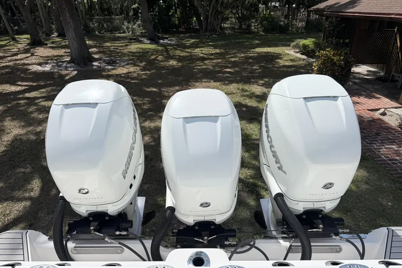 Slide: The Image of Triple Mercury outboard engines on a 2022 Sea Fox 368 Commander boat. - 5