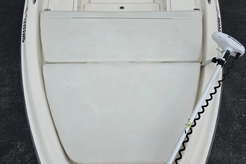 Slide: The Image of Bow of 2006 ShearWater 2400Z boat with trolling motor attached. - 11