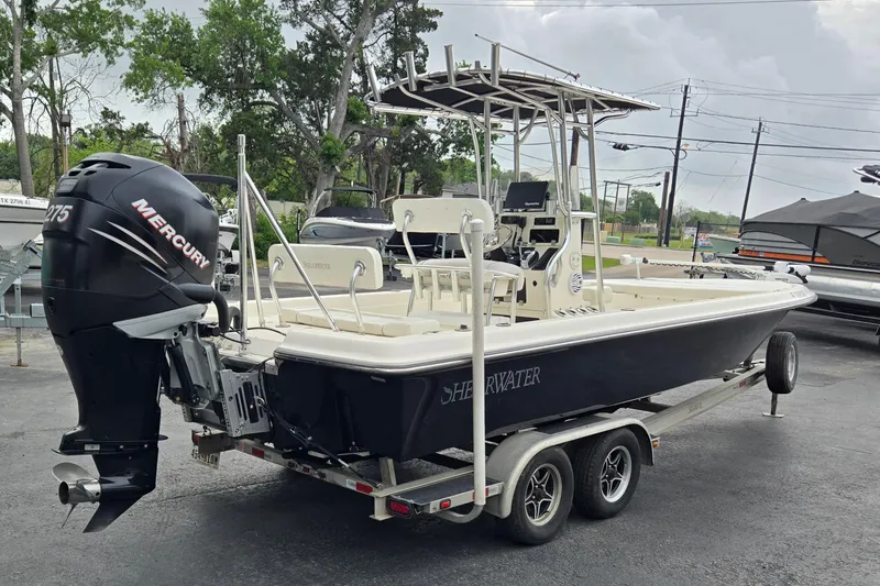 Slide: The Image of 2006 ShearWater 2400Z boat with Mercury 275 engine on trailer. - 3