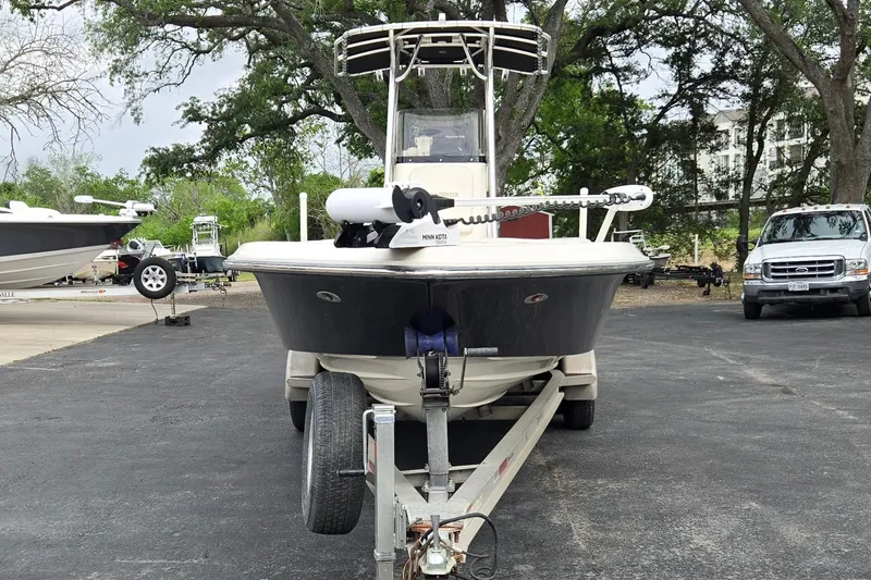Slide: The Image of 2006 ShearWater 2400Z boat on trailer in outdoor setting. - 8