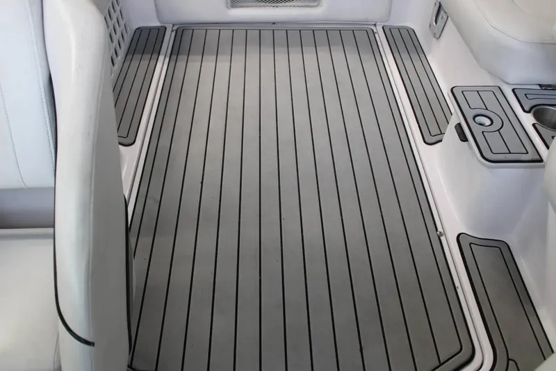 Slide: The Image of 2007 Nautique Super Air Nautique 230 interior with sleek, modern flooring design. - 10