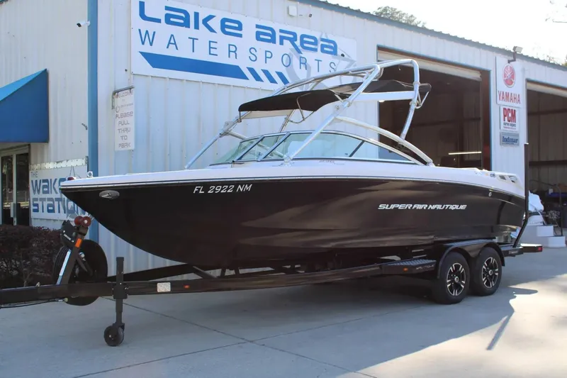 Slide: The Image of 2007 Nautique Super Air Nautique 230 boat on trailer at Lake Area Watersports. - 2