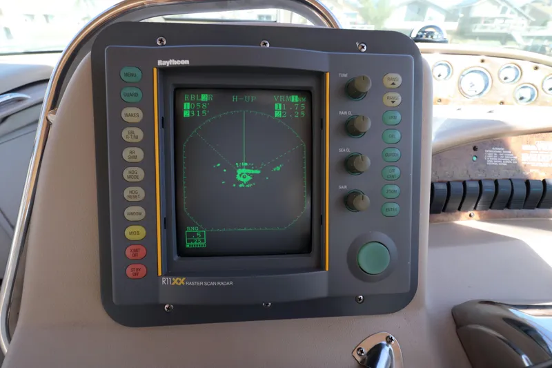 Slide: The Image of Raytheon radar display on 2000 Sea Ray 340 Sundancer boat dashboard. - 10