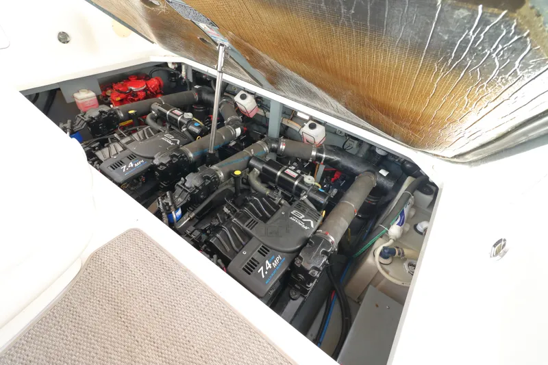 Slide: The Image of Engine compartment of a 2000 Sea Ray 340 Sundancer with twin 7.4 MPI engines. - 29