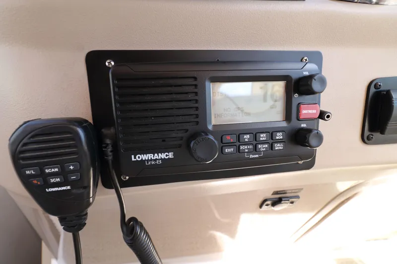 Slide: The Image of Lowrance Link-8 marine radio on 2000 Sea Ray 340 Sundancer dashboard. - 9