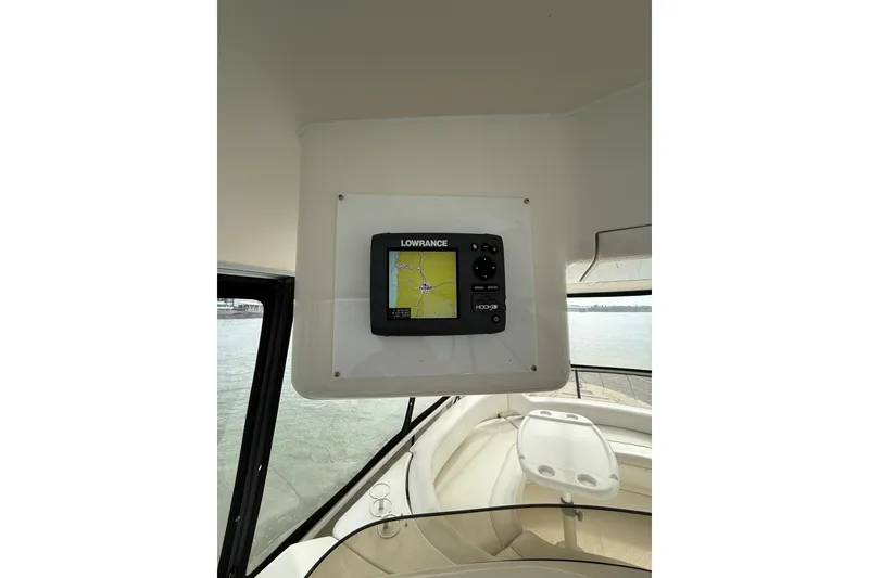 Slide: The Image of Lowrance navigation system on 1999 Sea Ray 560 Sedan Bridge yacht interior. - 17