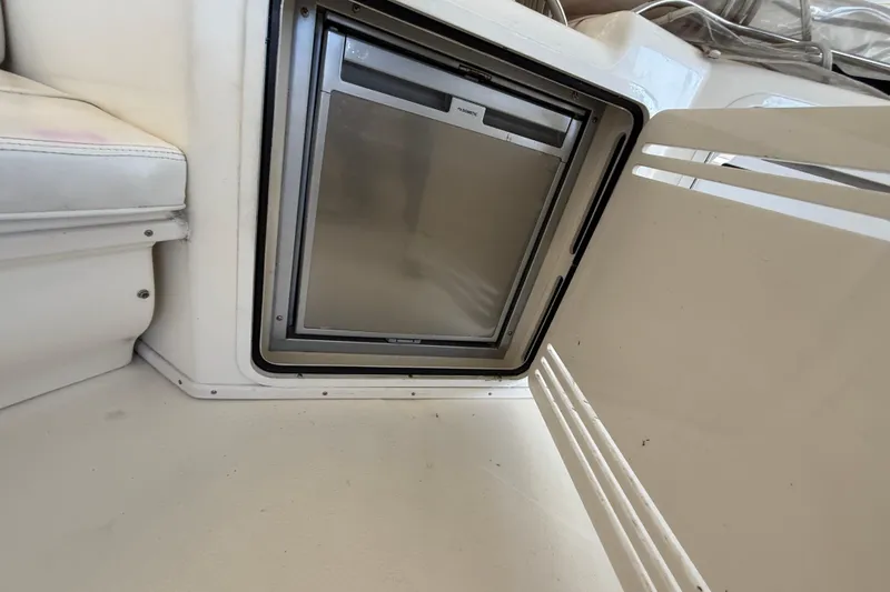Slide: The Image of Built-in refrigerator on a 1999 Sea Ray 560 Sedan Bridge yacht. - 22