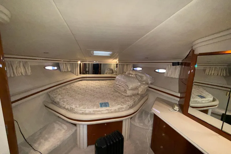 Slide: The Image of Luxurious cabin interior of a 1999 Sea Ray 560 Sedan Bridge yacht. - 39