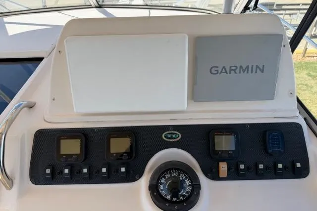 Slide: The Image of Dashboard of 2007 Grady-White Marlin 300 with Garmin navigation system. - 15