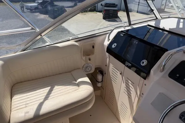 Slide: The Image of 2007 Grady-White Marlin 300 boat interior with seating and control panel. - 19