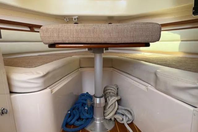 Slide: The Image of 2007 Grady-White Marlin 300 cabin interior with seating and ropes. - 30