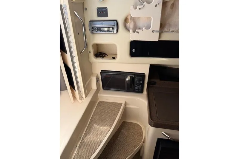 Slide: The Image of Interior of 2007 Grady-White Marlin 300 boat with microwave and stereo system. - 33