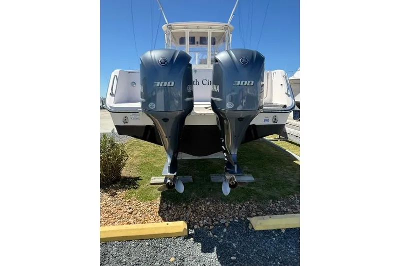 Slide: The Image of 2007 Grady-White Marlin 300 boat with twin Yamaha 300 engines, rear view. - 6