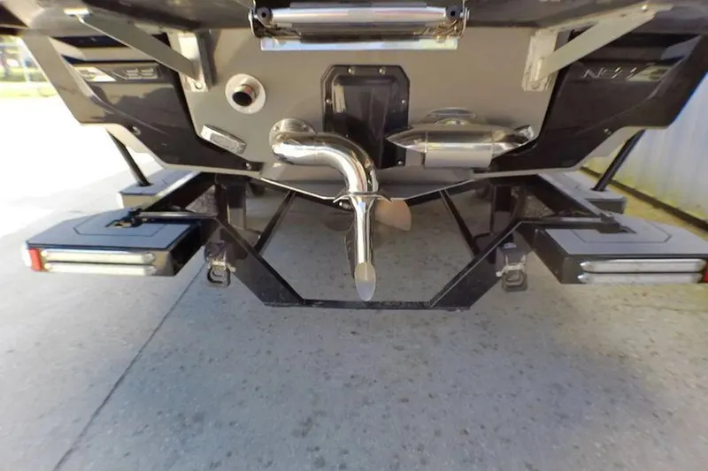 Slide: The Image of Rear view of 2021 Nautique Super Air Nautique G23 Coastal Edition boat propeller. - 13