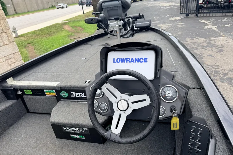 Slide: The Image of 2020 Vexus AVX1880 boat dashboard with Lowrance electronics and steering wheel. - 13