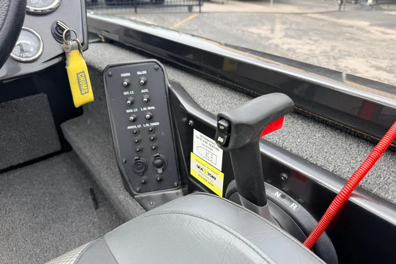 Slide: The Image of 2020 Vexus AVX1880 boat interior controls with throttle and switch panel. - 18