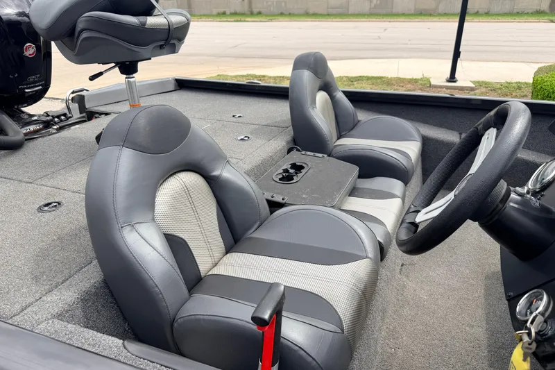 Slide: The Image of 2020 Vexus AVX1880 boat interior with gray seating and steering wheel. - 20