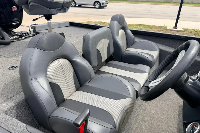 Slide: The Image of 2020 Vexus AVX1880 boat interior with gray seating and steering wheel. - 21