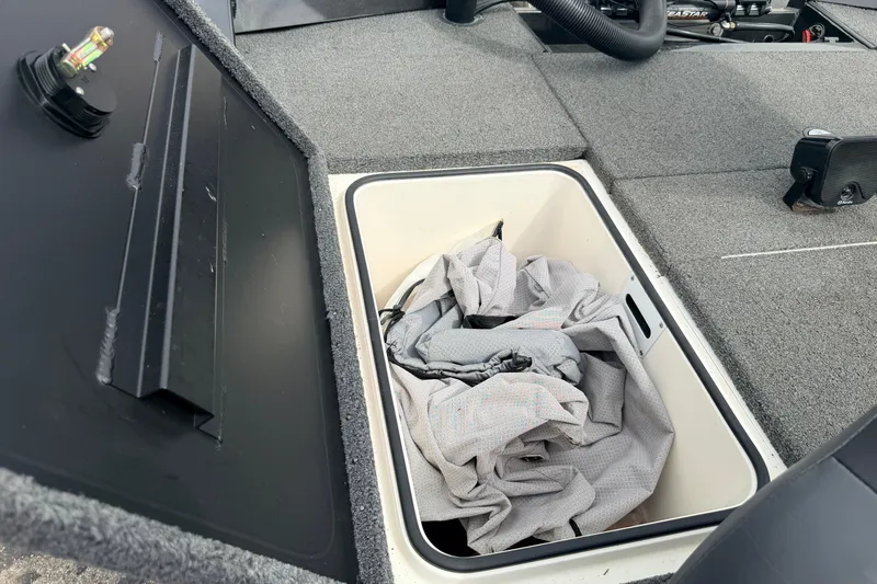Slide: The Image of Storage compartment in a 2020 Vexus AVX1880 boat with fabric inside. - 31