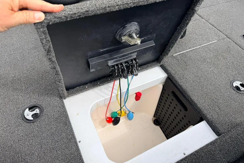 Slide: The Image of 2020 Vexus AVX1880 boat compartment with wiring and storage space. - 32