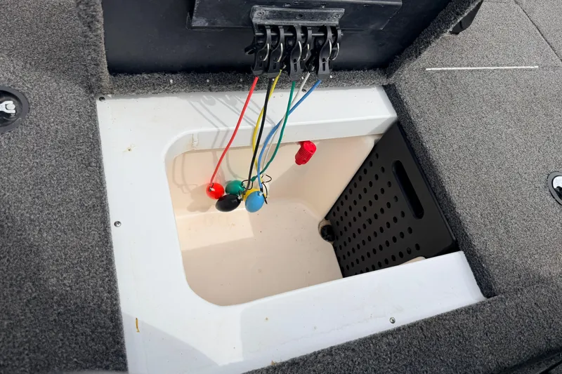 Slide: The Image of 2020 Vexus AVX1880 boat compartment with wiring and storage space. - 33