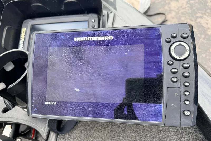 Slide: The Image of Humminbird Helix 8 fish finder on a 2020 Vexus AVX1880 boat dashboard. - 8