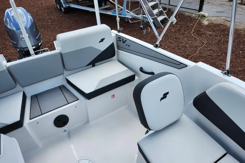 Slide: The Image of 2026 Starcraft SV 16 OB boat interior with modern seating and sleek design. - 13