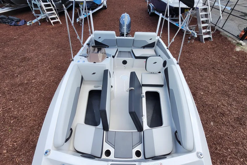 Slide: The Image of 2026 Starcraft SV 16 OB boat interior with seating and storage compartments. - 19