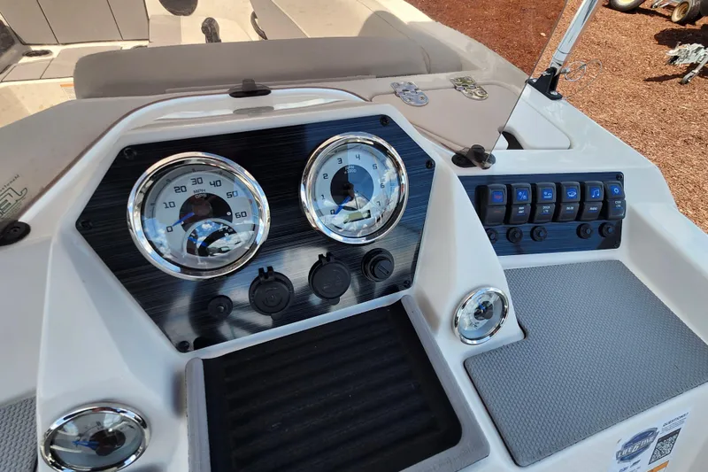 Slide: The Image of Dashboard of 2026 Starcraft SV 16 OB boat with gauges and controls. - 23