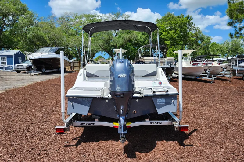 Slide: The Image of 2026 Starcraft SV 16 OB boat with Yamaha 90 engine on trailer, outdoor display. - 6