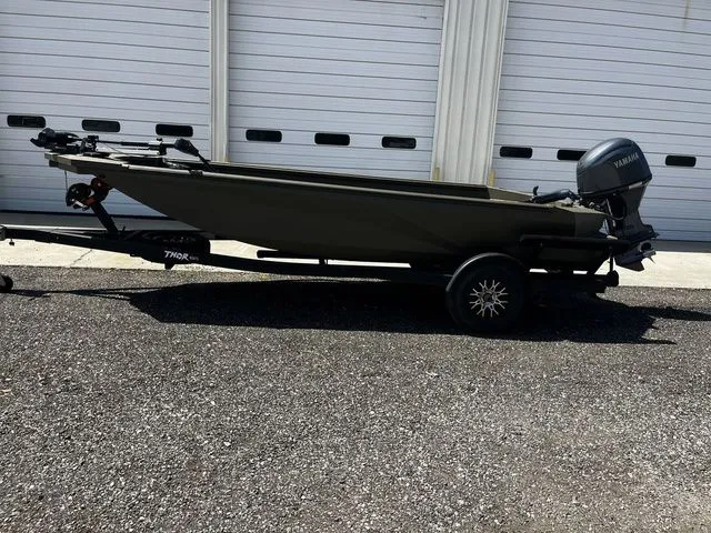 The Image of Green Thor 1754 Fish Hammer boat, 2026 model, on trailer. - 1