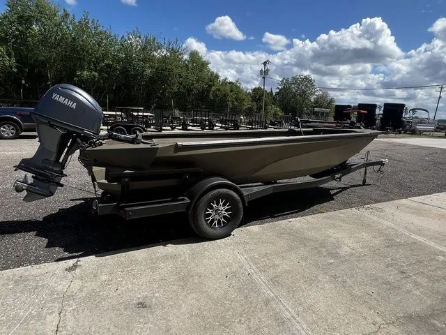 Slide: The Image of Thor 1754 Fish Hammer boat 2026 on trailer, green, with Yamaha motor. - 5