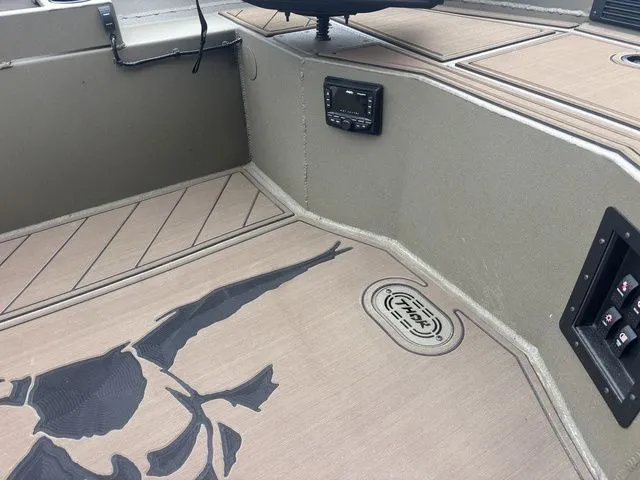 Slide: The Image of Interior of Thor Boats 1860 Lake Hammer Elite 2026 with stylish flooring. - 11