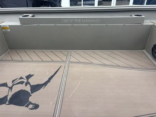 Slide: The Image of Interior of Thor Boats 1860 Lake Hammer Elite 2026 with "Drop the Hammer" engraving. - 16